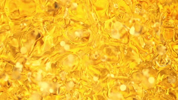 Super Slow Motion Shot of Golden Liquid Luxury Background at 1000Fps