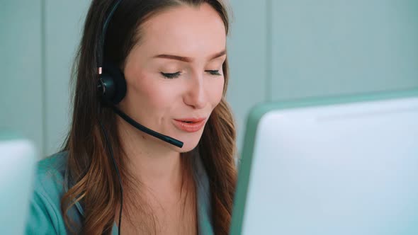 Business People Wearing Headset Working in Office