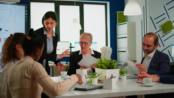 Woman Secretary Bringing Documents and Coffee To Executive Director