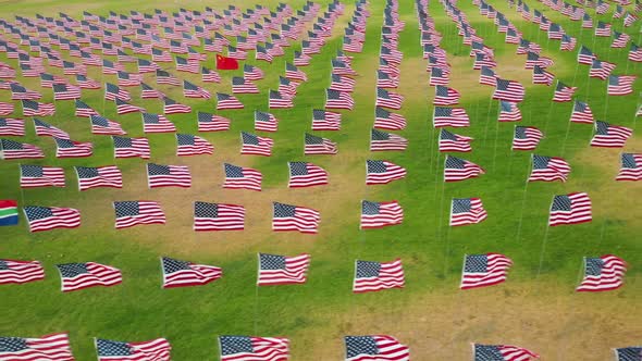 American Flags With Other Countries National Flag At Alumni Park In Pepperdine University. - aerial