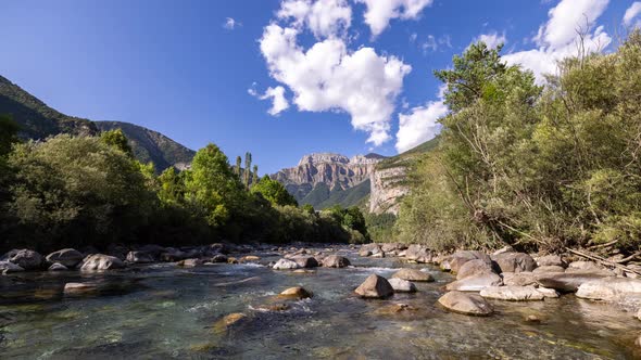 Clouds Passing Over Monte Pedido Mountains and River