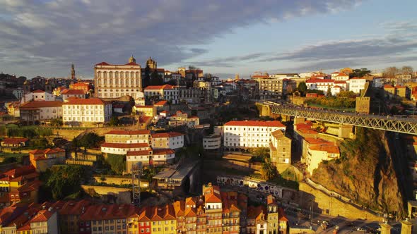 Many Old Houses on the River Slope in Porto at Sunset