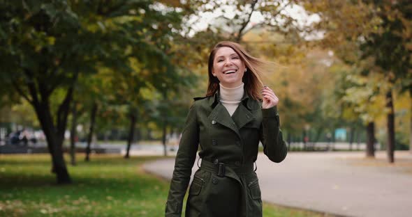 Happy Woman Smiling at the Autumn Day Slow Motion