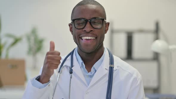 Thumbs Up By African Doctor in Clinic