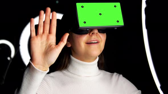 Happy Woman in Vr Glasses Over Dark Background