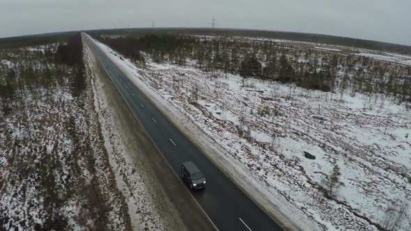 Car Driving on the Route in Winter