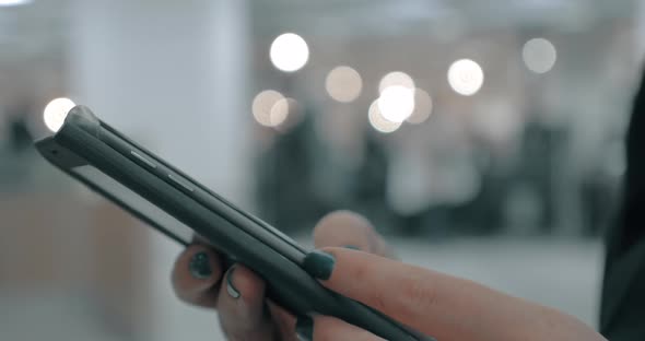 Woman Surfing Internet on Cellphone