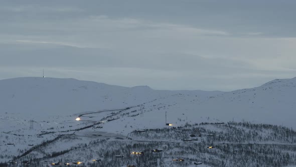 Snow Covered Mountains And Forest Scenery At Dawn In Haugastol Norway -- timelapse