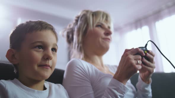 Close Up Mom with Son Communicating During Game