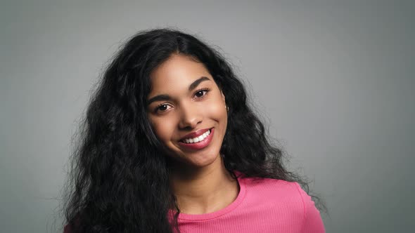 Close up portrait of a smiling young beautiful African woman