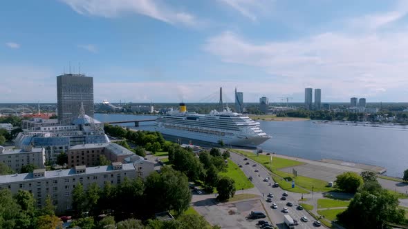 Beautiful Cruise Ship Docked in Riga Latvia Near the Old Town and the Bridge