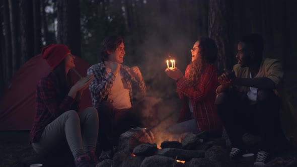 Creative People Are Congratulating Their Friend on Birthday in Forest, Clapping Hands and Giving Her