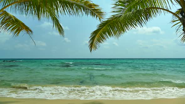 Beautiful tropical beach sea ocean with blue sky and white cloud