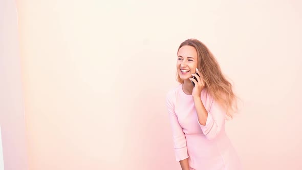 Pretty Young Woman Talking By Phone