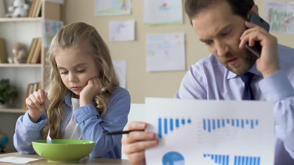 Upset Daughter Looking at Working Father, Lack of Family Communication, Ignore