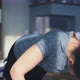 Woman with Ponytail Does Push Ups Standing on Knees in Room - VideoHive Item for Sale