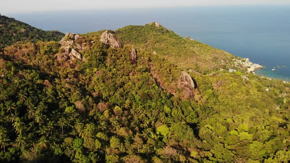 Jungles and Mountains of Tropical Island. Drone View of Green Jungles and Huge Boulders