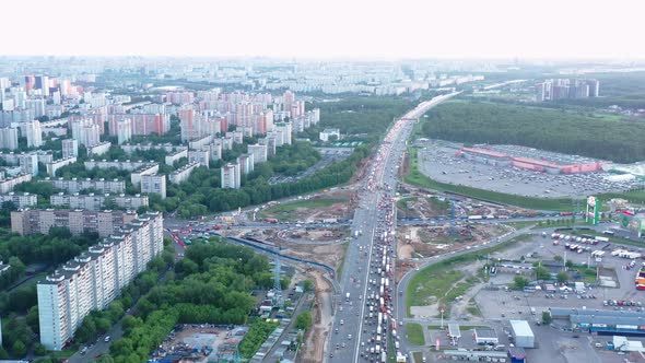 Very Large Traffic Jams on the Expressway Due to the Reconstruction of the Traffic Intersection