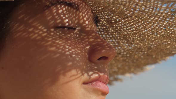 Beach Woman in Sun Hat on Vacation