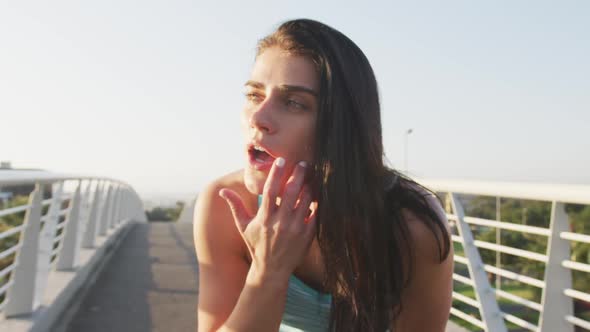 Young woman tired after running