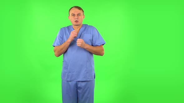 Medical Man Is Very Frightened, Then Sighs in Relief. Green Screen