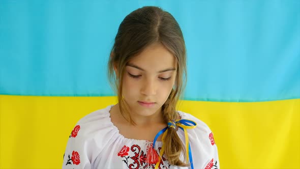 A Ukrainian Patriot Child in an Embroidered Shirt