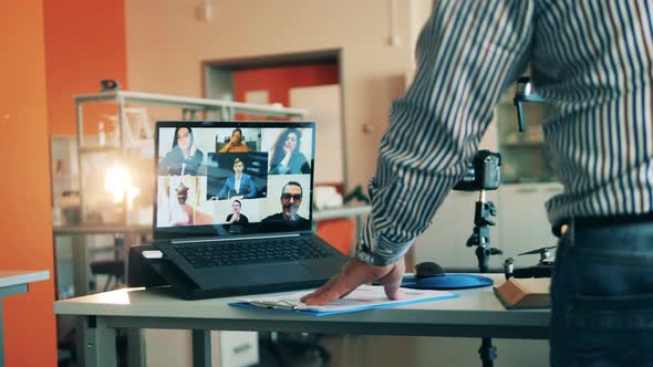 A Teacher Is Showing a Drone To Adult Students During Online Class. Remote Education, Online College