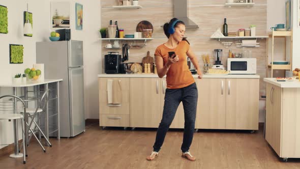 Energetic Dancing in Kitchen