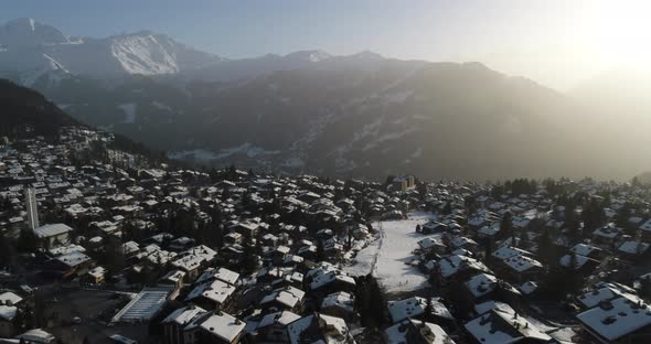 Aerial Shot of a Village in Switzerland That Was Covered in Snow at a Popular Destination for Skiers