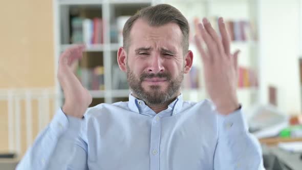 Portrait of Sad Young Man Having Loss Failure