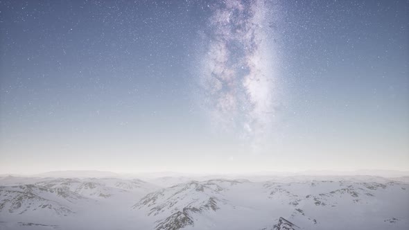 Milky Way Above Snow Covered Terrain alt