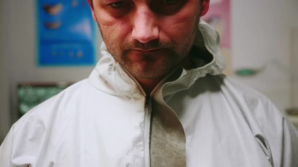 Close Up of Tired Pediatric Dentist Man with Marks on Face