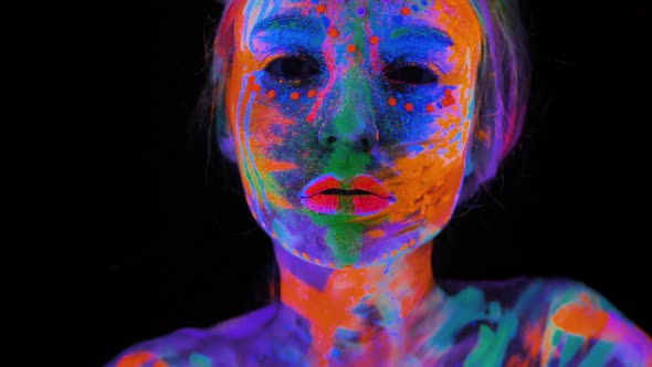 Beautiful Young Woman in Neon Light