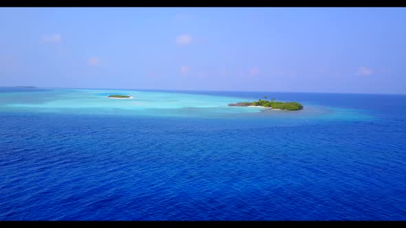 Aerial top view landscape of exotic island beach lifestyle by blue sea with white sand background of