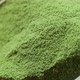 Slow Motion Macro of an Iron Spoon with Handful Matcha Being Poured Into Cup - VideoHive Item for Sale