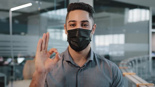 Closeup Corporate Business Portrait Arabian Indian Man Wears Black Protective Medical Face Mask