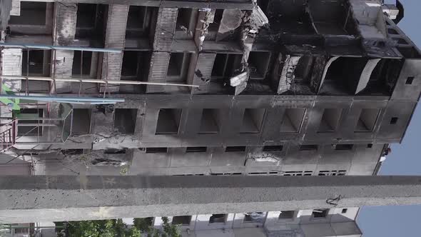 Vertical Video of the Consequences of the War in Ukraine  a Destroyed Building