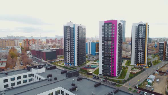 Highrise Residential Buildings with Bright Ornament in City