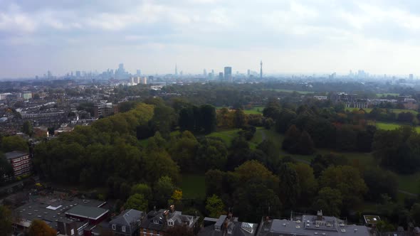 Beautiful Aerial View of London with Many Green Parks and City Skyscrapers