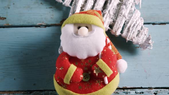 Handmade santa claus on wooden table