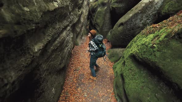 Girl Walks in Cave