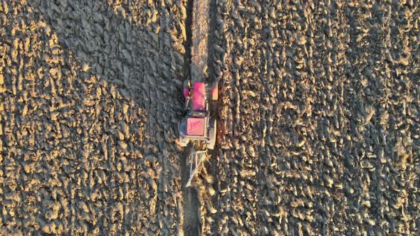 Tractor Plowing Fields Preparing Land for Sowing