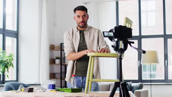 Man or Blogger Showing Old Chair Renovation