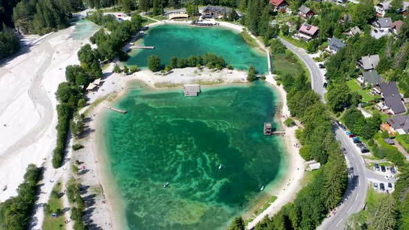 Aerial footage of a beautiful lake with turquoise water, full view of Jasna lake