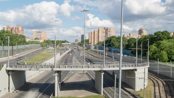 Day View of Highway Traffic Cars at Multiple Speedway.