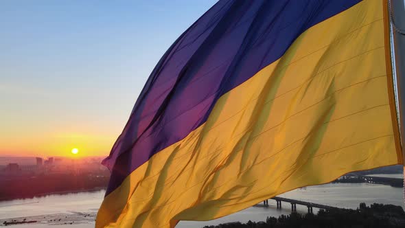 Ukrainian Flag in the Morning at Dawn. Aerial. Kyiv. Ukraine