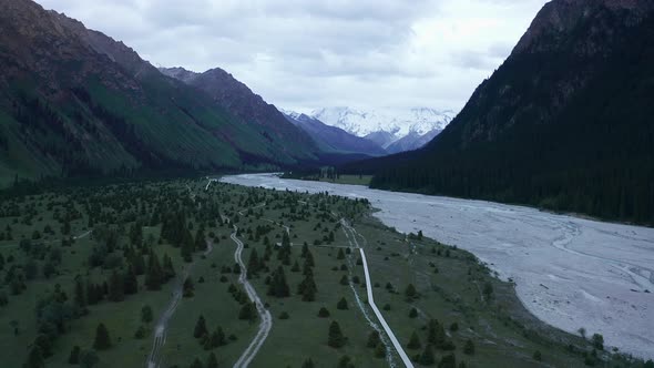 Mountains and trees in a cloudy day