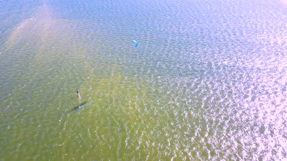 Aerial view of kitesurfing on a hydrofoil board, Queensland, Australia.