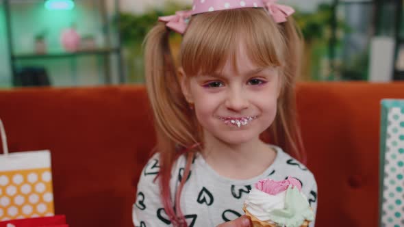 Young Little Children Girl with Lots of Gift Presents Celebrating Birthday Party Eating Dessert Cake