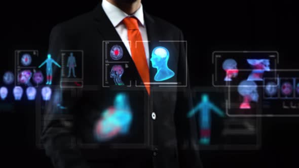 Male Uses Holographic Interface, in Black Suit Working at Technological Medical Digital Monitor, a